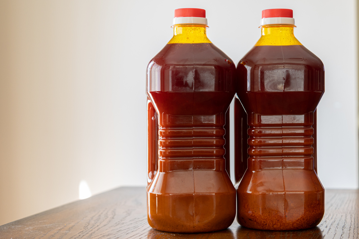 Two Bottles of Red Palm Cooking Oil